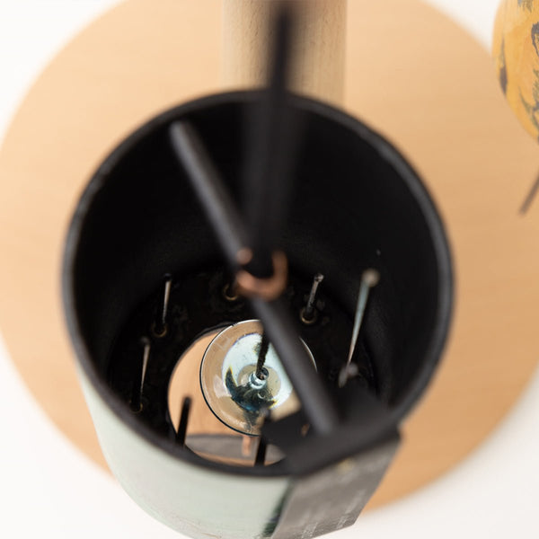 Zaphir Chime close up, handcrafted, cellulose resonance tube with eight silver-welded metal cords,