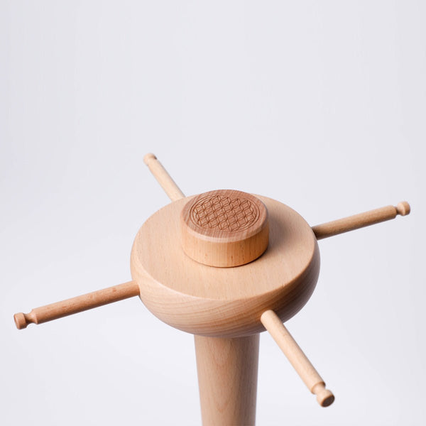 Zenmotion Chime Stand from Gaiachimes, close up of rotatiny disc where you can hang the chimes on, Flower of Life engraving, spiritual geometry,