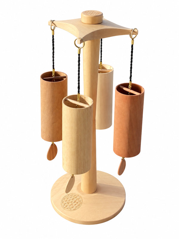 Koshi Earth Symphony set of 4 wind chimes on the Premium Flower of Life rotating stand, angled view, white background