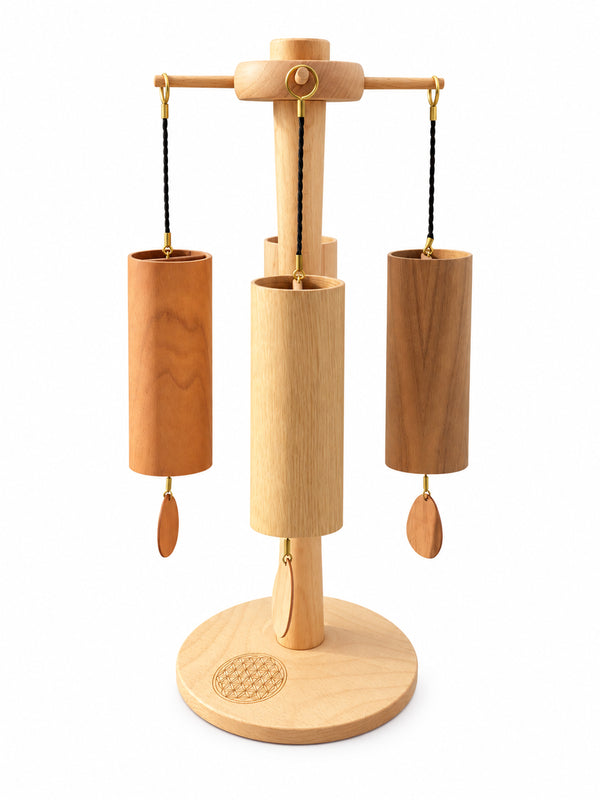 Koshi Earth Symphony set of 4 wind chimes on the Zenmotion rotating stand, front view, white background